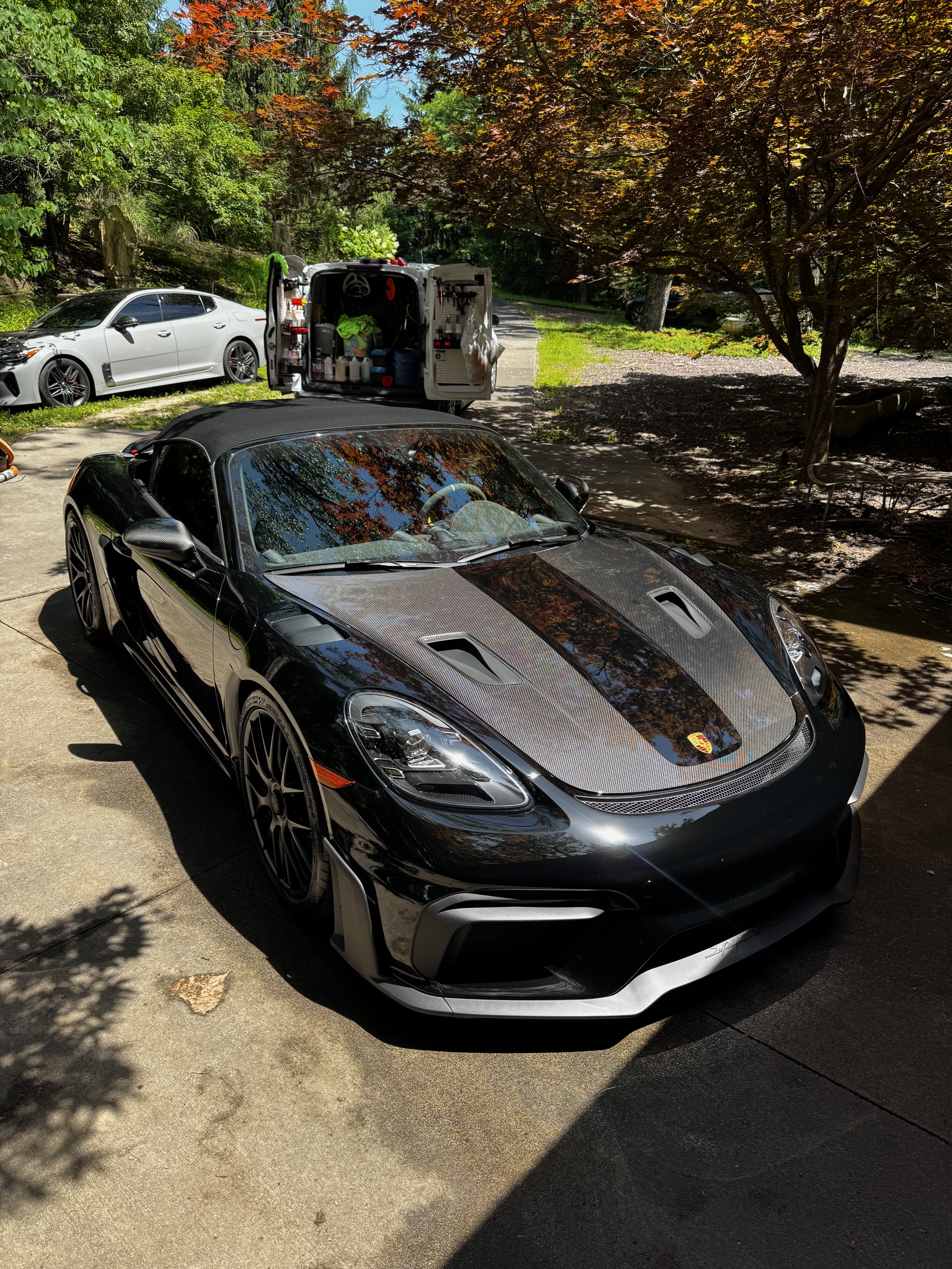 Black Porsche 718 GT4 RS detailed by M&W Mobile Detail
